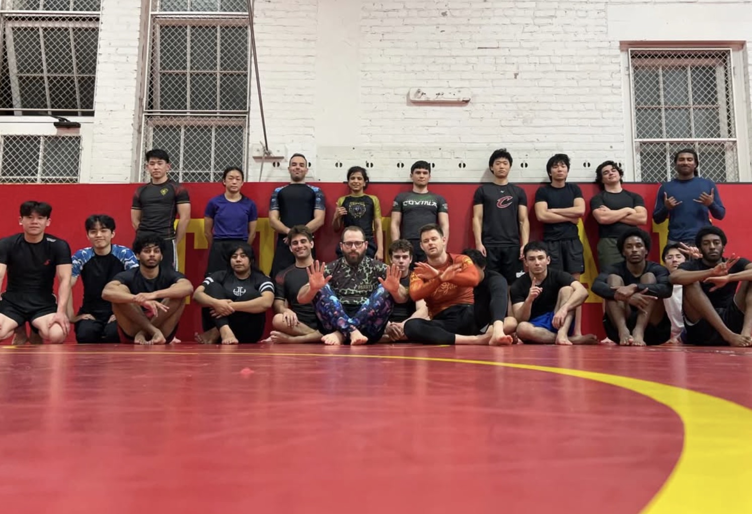 USC Brazilian Jiu-Jitsu club members together on the mat after a training session